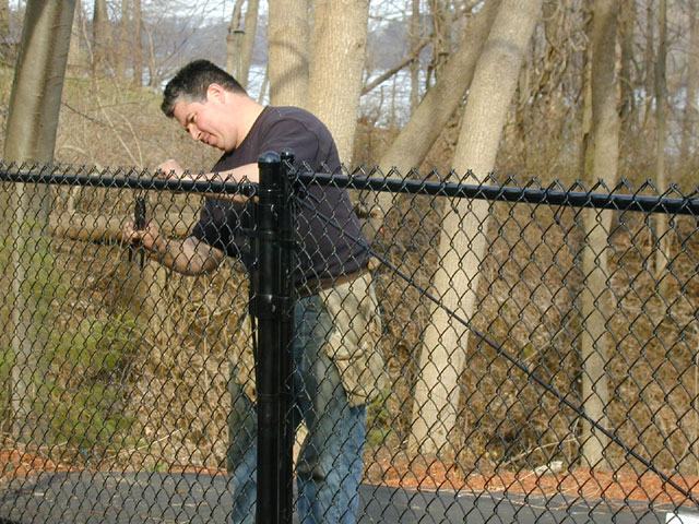 Owner Chris Abel tying in the top of Chain Link